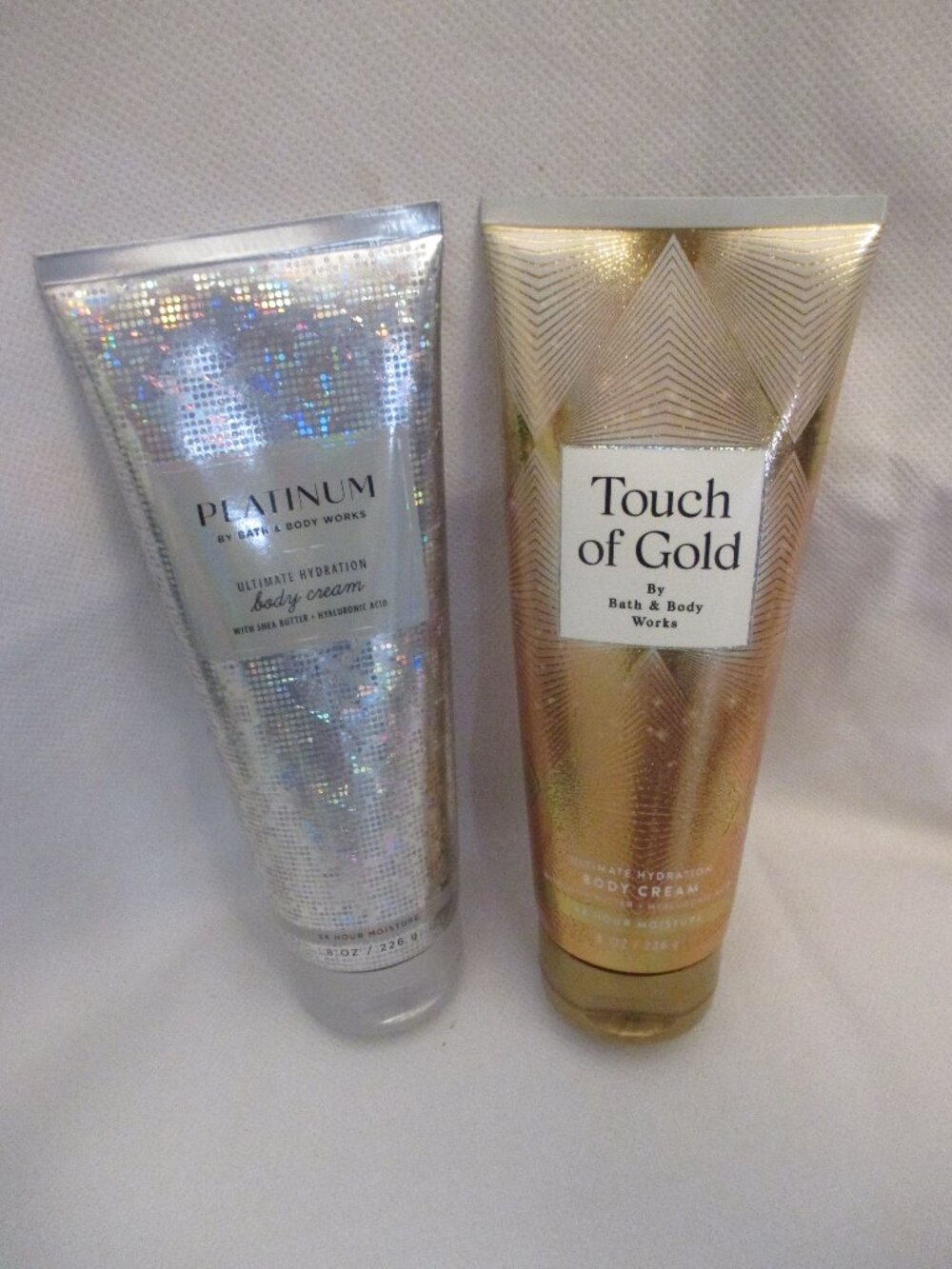 Bath & Body Works 2 pc. bundle - 8 oz. Touch of Gold & 8 oz. Platinum Body Cream